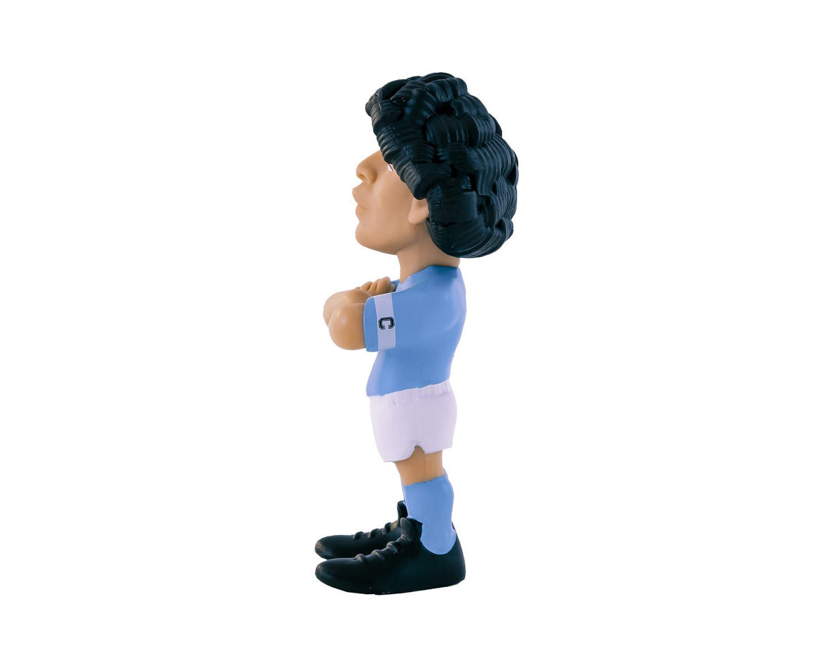 Minix Diego Maradona Napoli figurine with sculpted dark curls, blue jersey, white shorts and black boots, shown in profile.
