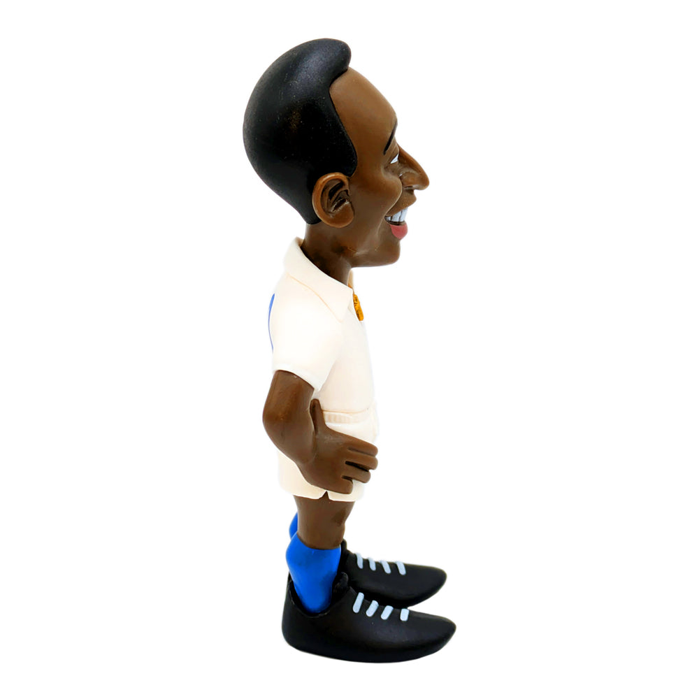 Pelé football figurine, Minix Pelé Escape to Victory Edition, with dark skin, black hair, white kit and black boots.
