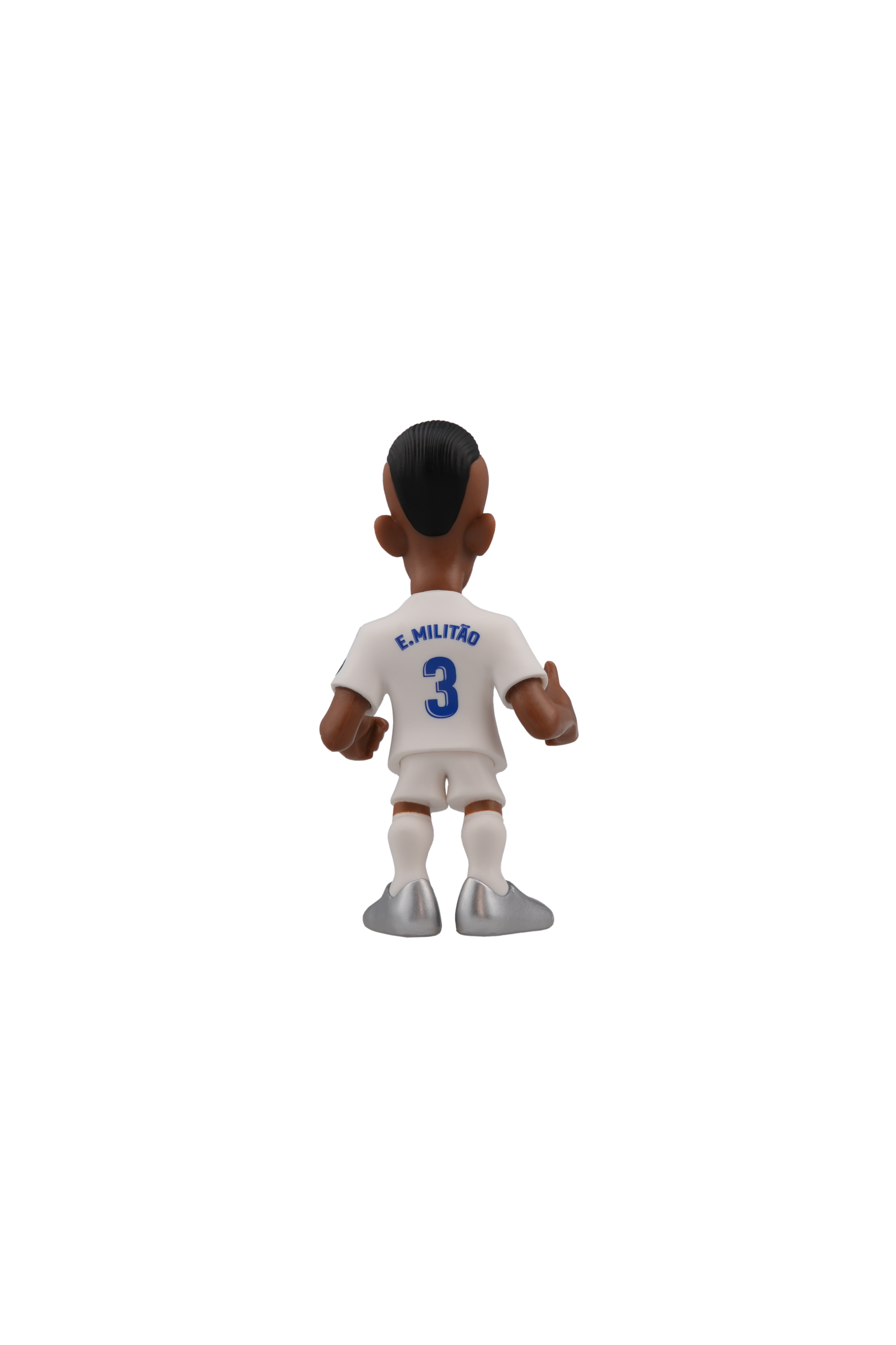 Minix Real Madrid collectible figurine of football player E. Militão in white kit, 12cm tall, officially licensed.