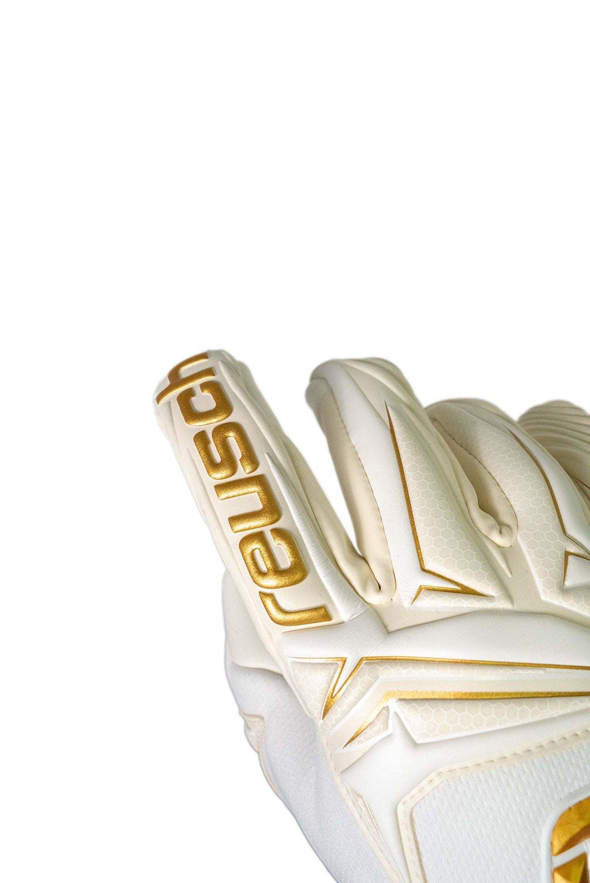 Reusch Attrakt AB1 goalkeeper glove in white latex with gold accents, featuring raised branding and a textured backhand.