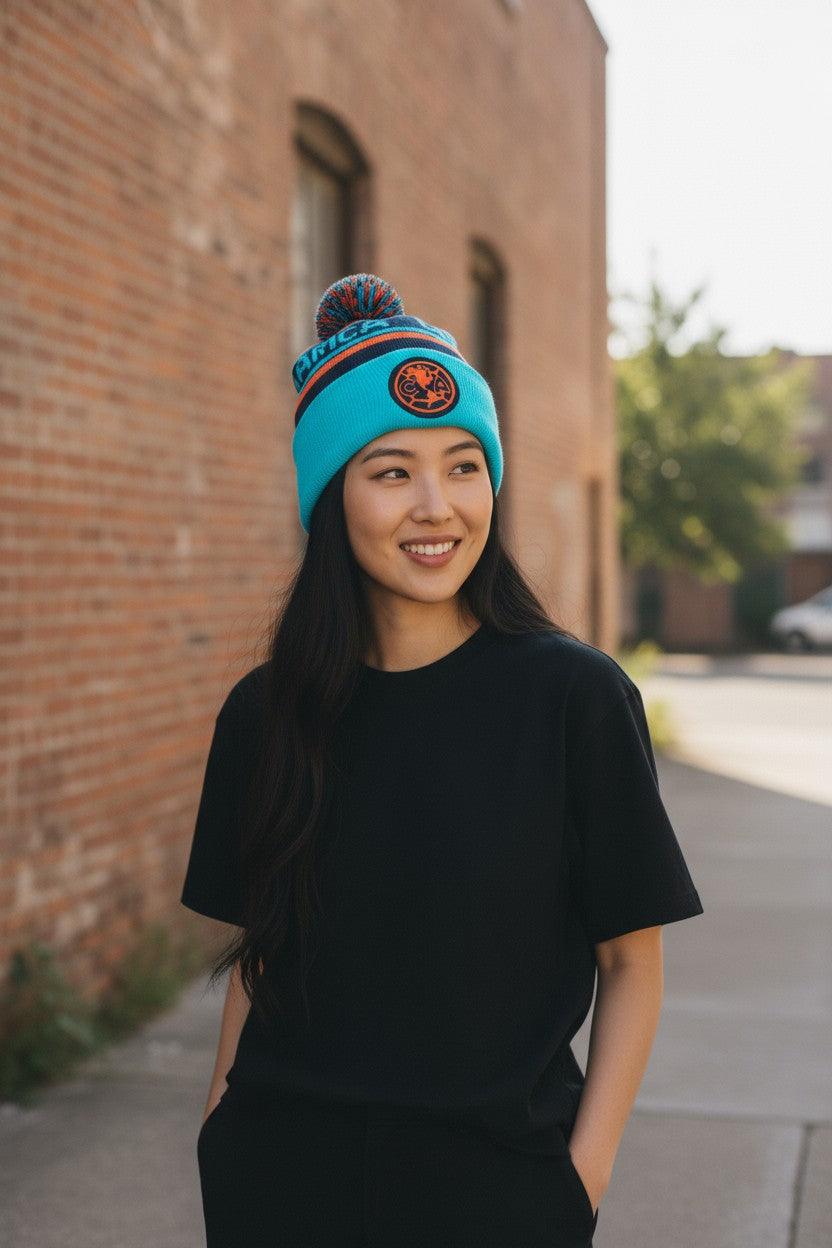 Fan Ink unisex premium Football Beaniet with embroidered team crest worn by woman outdoors