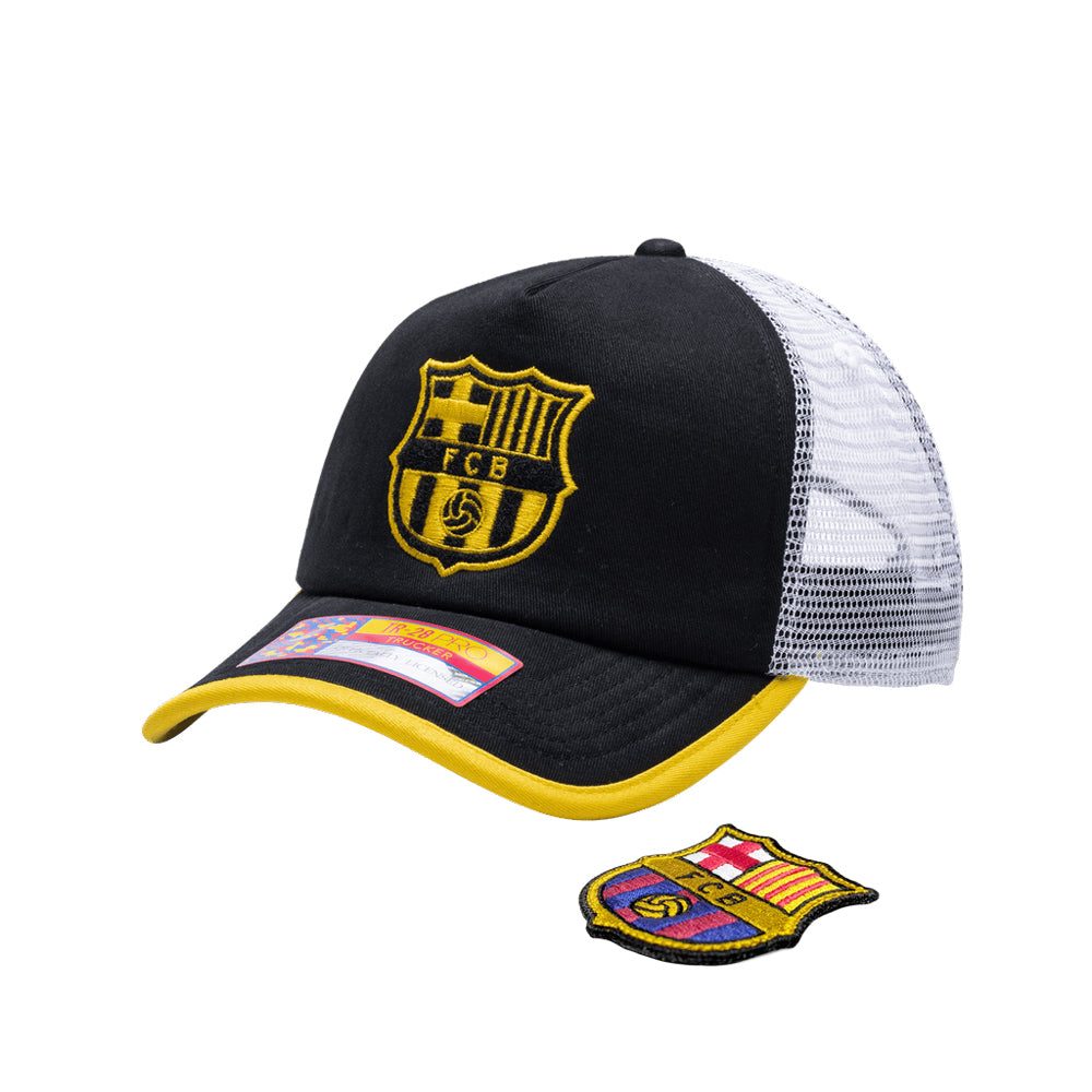 FC Barcelona One8th Strike Trucker Hat with interchangeable patch, black and yellow front, breathable white mesh back, and adjustable snapback.