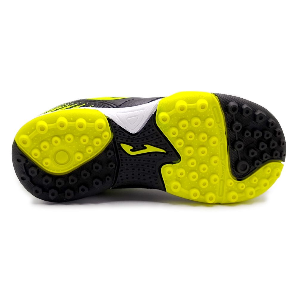 Joma Toledo Junior Turf Soccer Shoes with yellow rubber outsole for traction on synthetic grass.