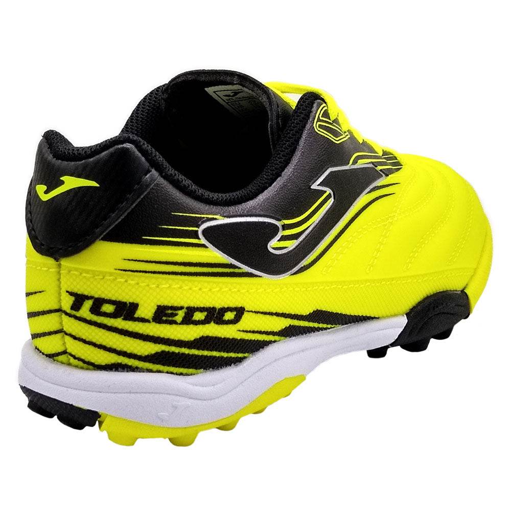 Joma Toledo Junior Kids Turf Soccer Shoes - Star Player Edition in bright yellow, designed for comfort and excellent traction on artificial surfaces.