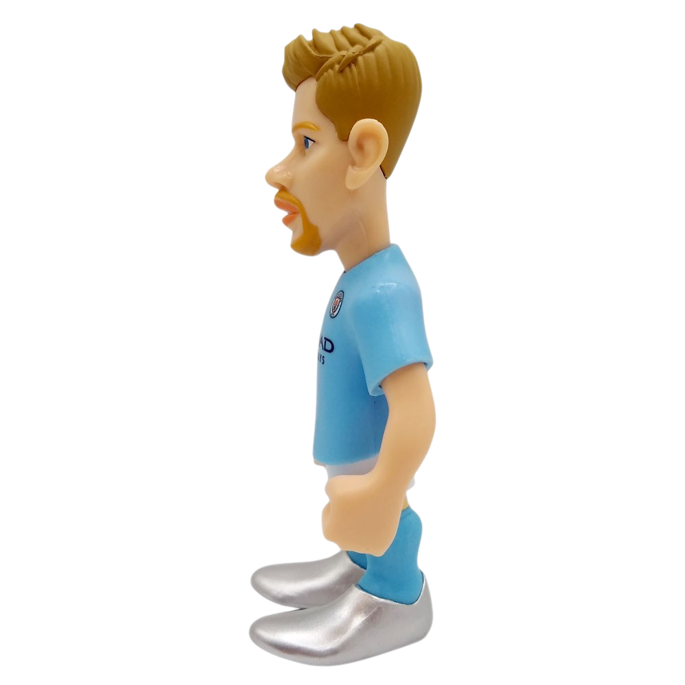 Minix Kevin De Bruyne Manchester City figurine in a light blue kit, with molded brown hair and oversized silver boots.