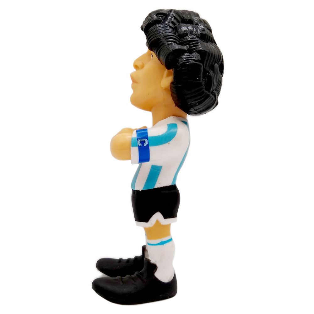 Minix Diego Maradona Argentina Figurine with black hair, a sky blue and white striped jersey, black shorts and boots.