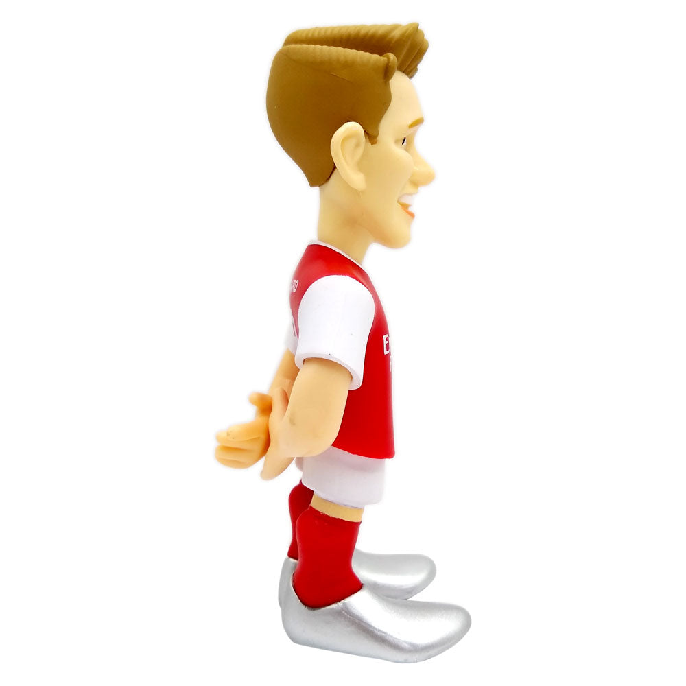 Minix Martin Ødegaard Arsenal figurine with a swept-back brown hairstyle, red-and-white kit and silver boots.