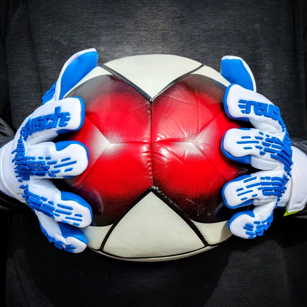 Reusch Pure Contact Freegel Gold X goalkeeper gloves with pro grip, lightweight fit, and all-weather control