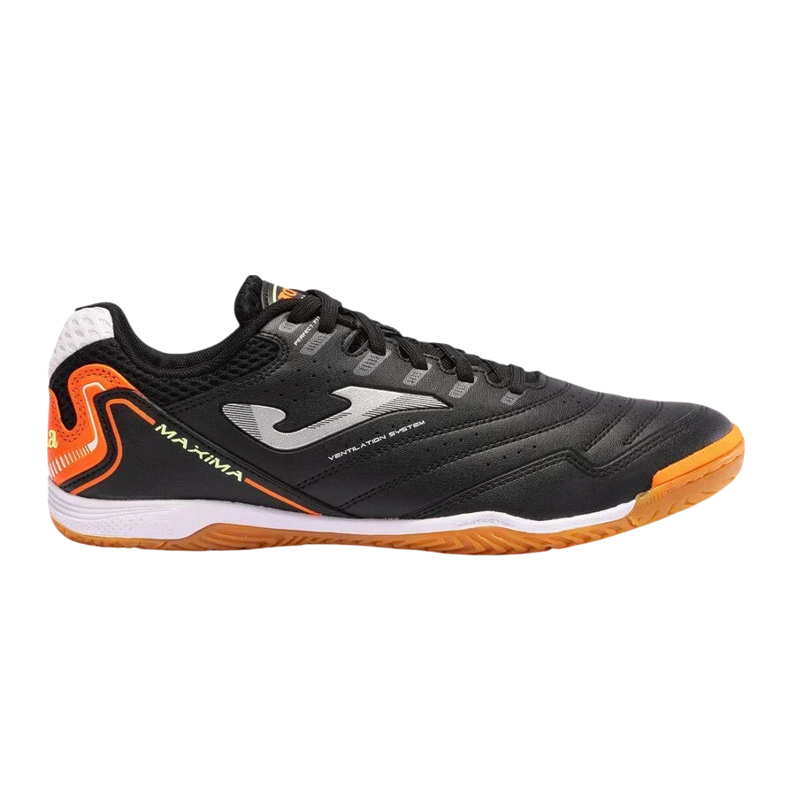 Joma Maxima indoor soccer shoe with a black synthetic upper, orange heel accents, gray logo and gum rubber sole