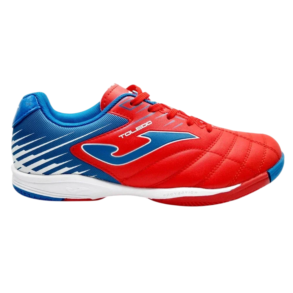 Joma Toledo indoor soccer shoe in red and blue synthetic material, with a white Joma logo and striped heel panel