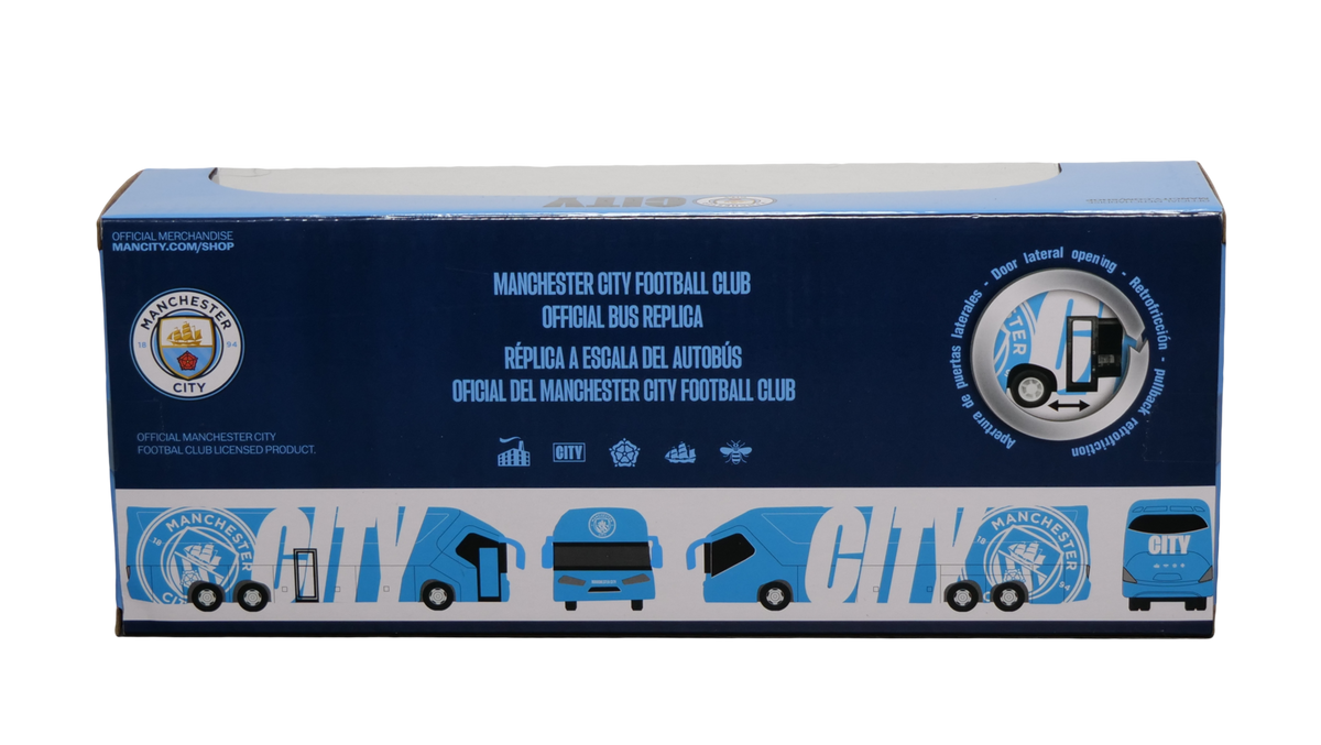 Manchester City Mini Team Bus collectible in a dark blue and sky blue box with bus graphics and club crests