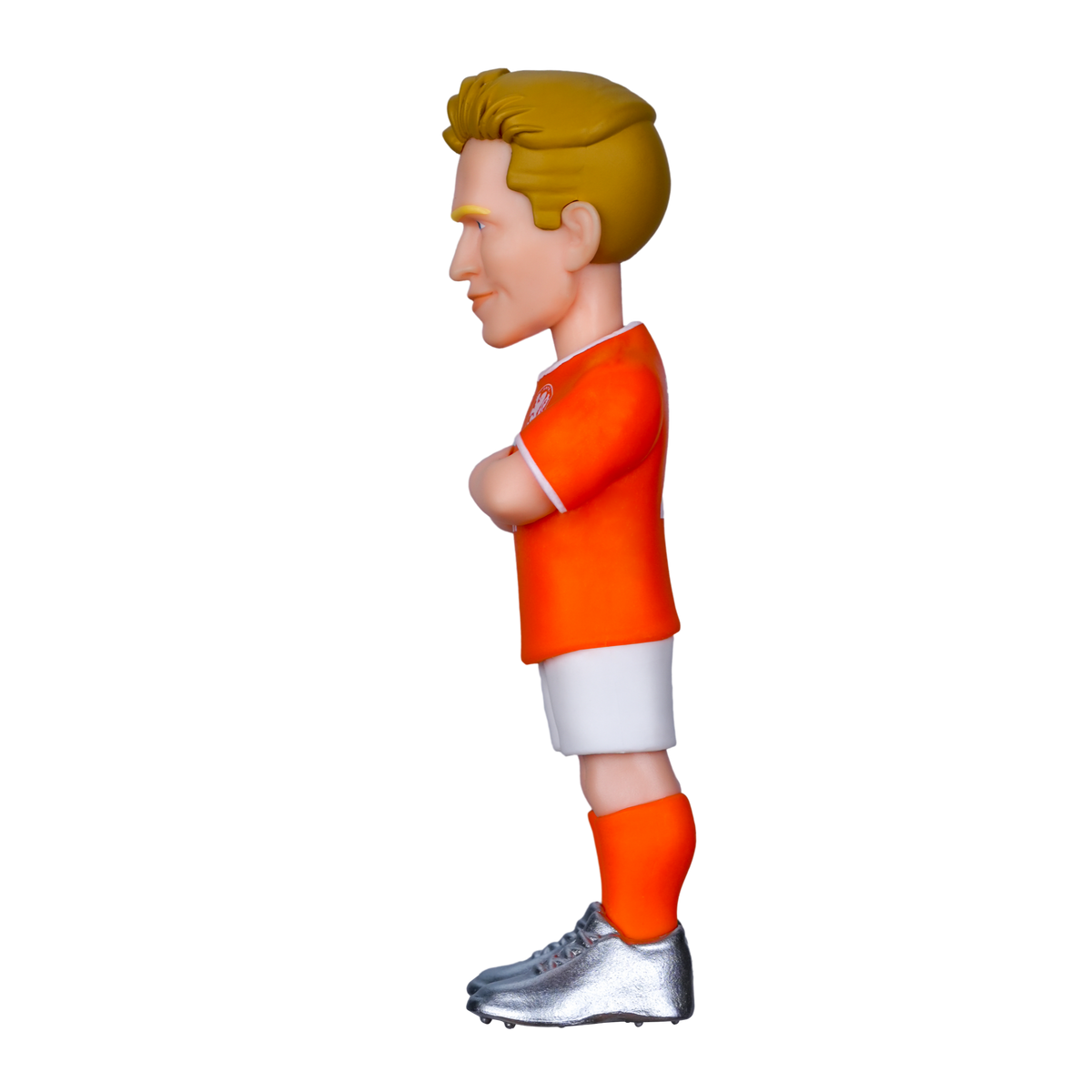 Minix Frenkie de Jong figurine in a bright orange football shirt, white shorts and silver boots, arms crossed