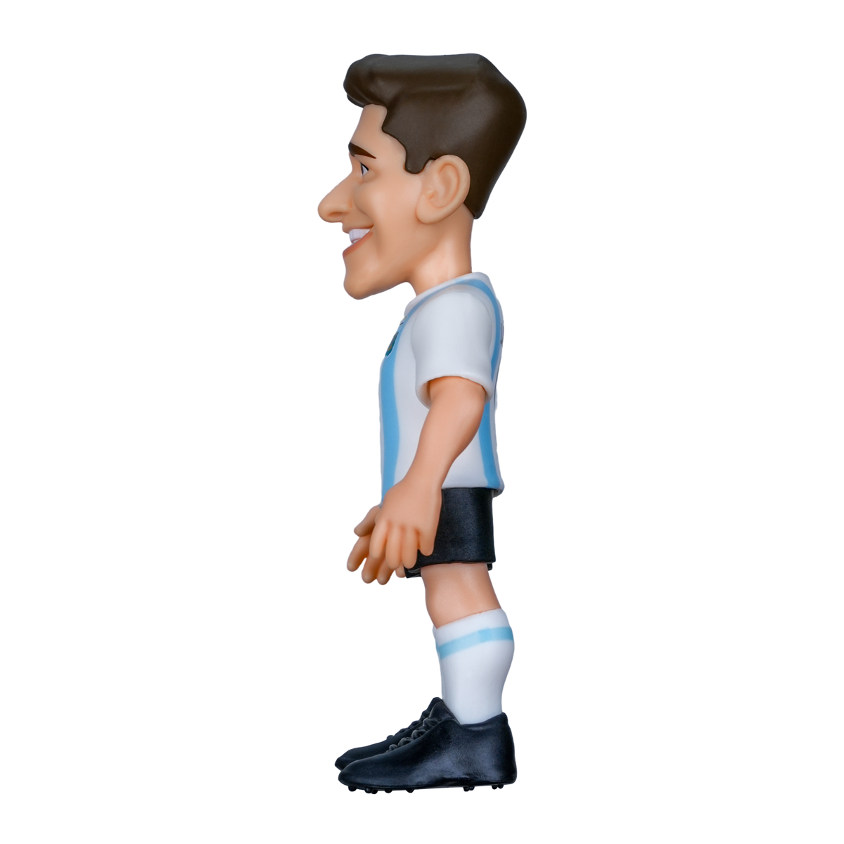 Minix Julián Álvarez figurine with dark sculpted hair, wearing Argentina's white and sky-blue striped shirt, black shorts and boots