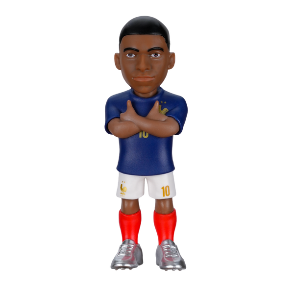 Minix Kylian Mbappé France figurine in a blue jersey, white shorts and red socks, posing with crossed arms