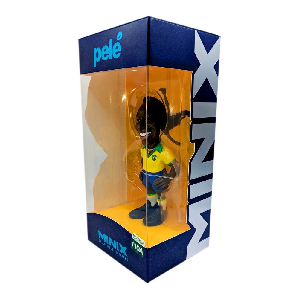 Minix Pelé Brazil Home Kit figurine in yellow shirt and blue shorts, displayed inside a clear-front navy box