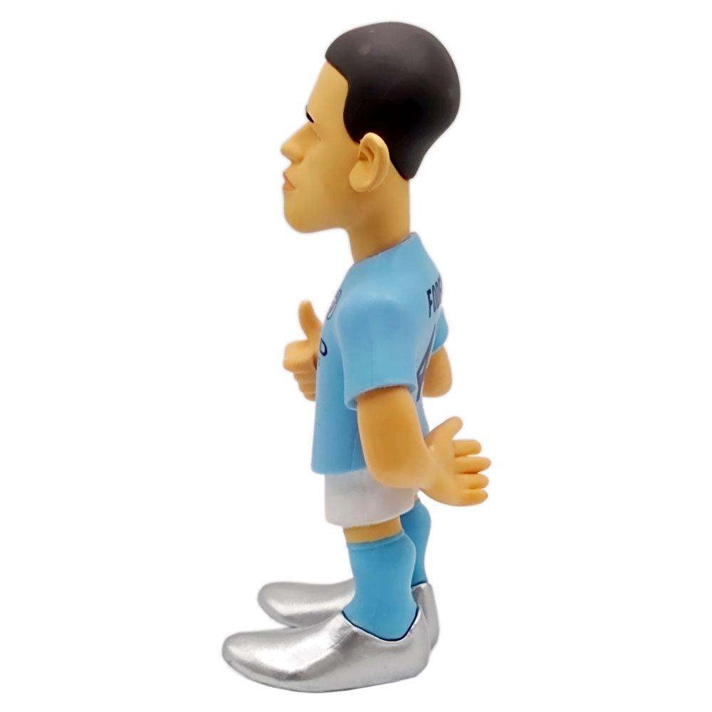 Minix Phil Foden Manchester City figurine in a sky-blue football kit, with sculpted black hair and silver boots