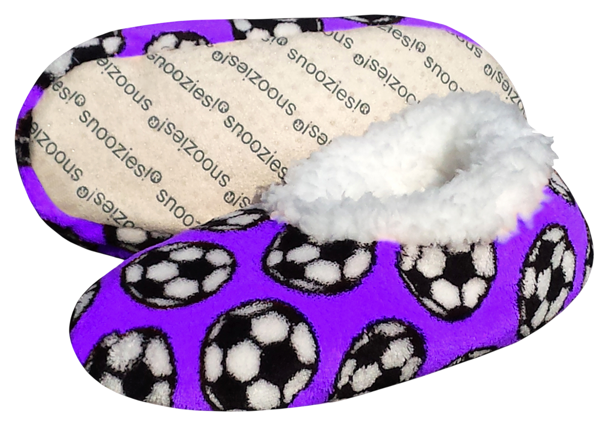 Sport Slippers with a vivid purple fabric upper patterned with black and white soccer balls and a fluffy white lining