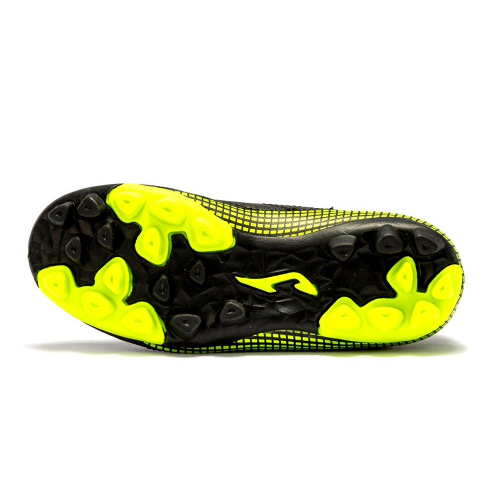 Joma Toledo Junior Molded 24 Soccer Shoes outsole with yellow accents for traction on natural and synthetic surfaces.