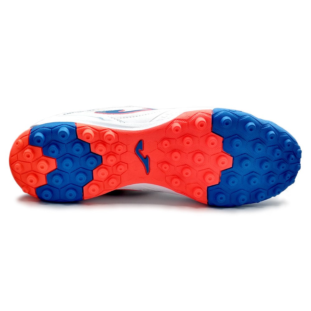 Joma Dribling Turf Adult Soccer Shoes with durable blue and red sole for optimal performance on indoor surfaces.