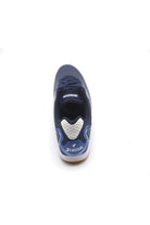 Joma Maxima white unisex futsal shoe with synthetic upper, rubber sole, and lace closure