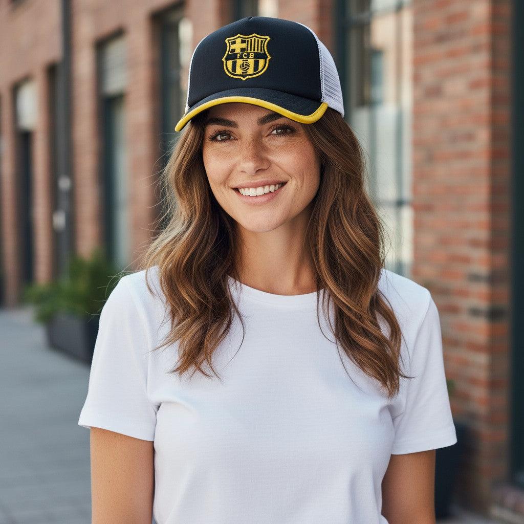 Woman wearing FC Barcelona One8th Strike Trucker Hat with interchangeable patch and breathable mesh back