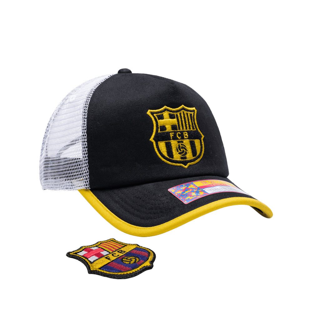 FC Barcelona One8th Strike Trucker Hat with interchangeable front patch, black and yellow cotton twill front, white breathable mesh back, and adjustable snapback fit.