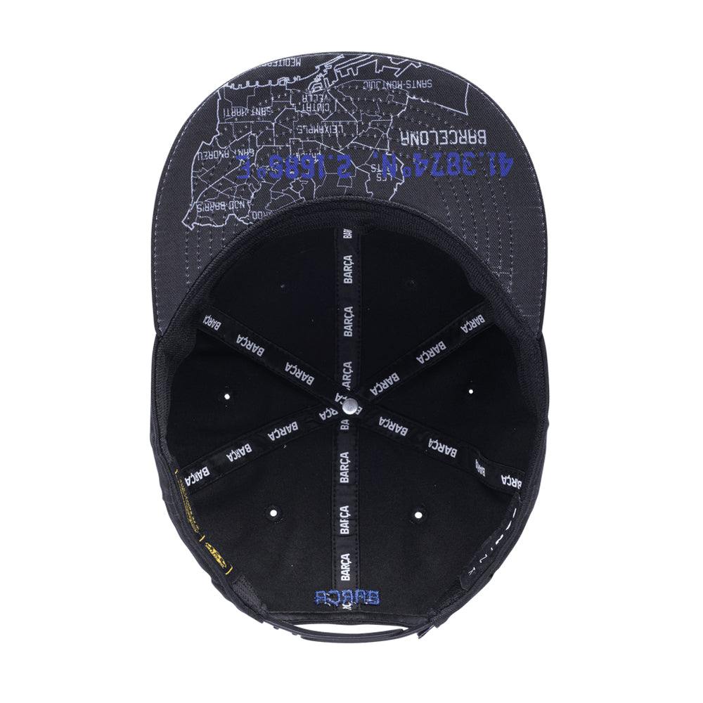 Black FC Barcelona Locale Snapback Hat with adjustable strap and map print under the flat brim, featuring branded inner lining.