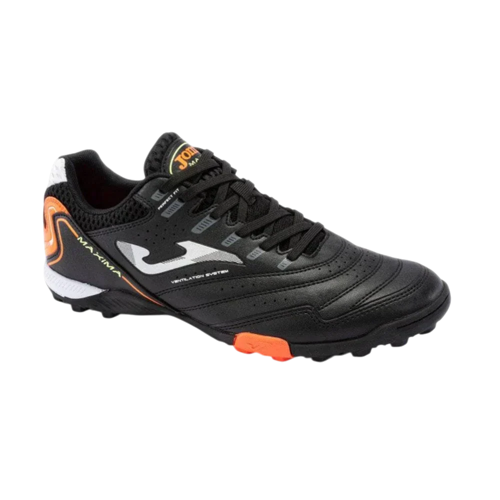 Joma Maxima turf soccer shoe in black synthetic material with orange accents, grey logo, and textured rubber studs