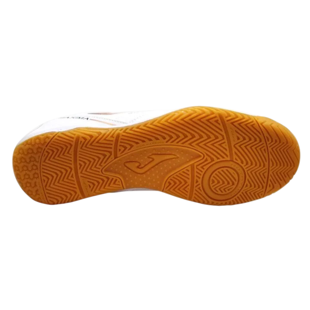 Joma Maxima indoor soccer shoe with a gum rubber outsole, patterned with geometric traction grooves and circular grip zones