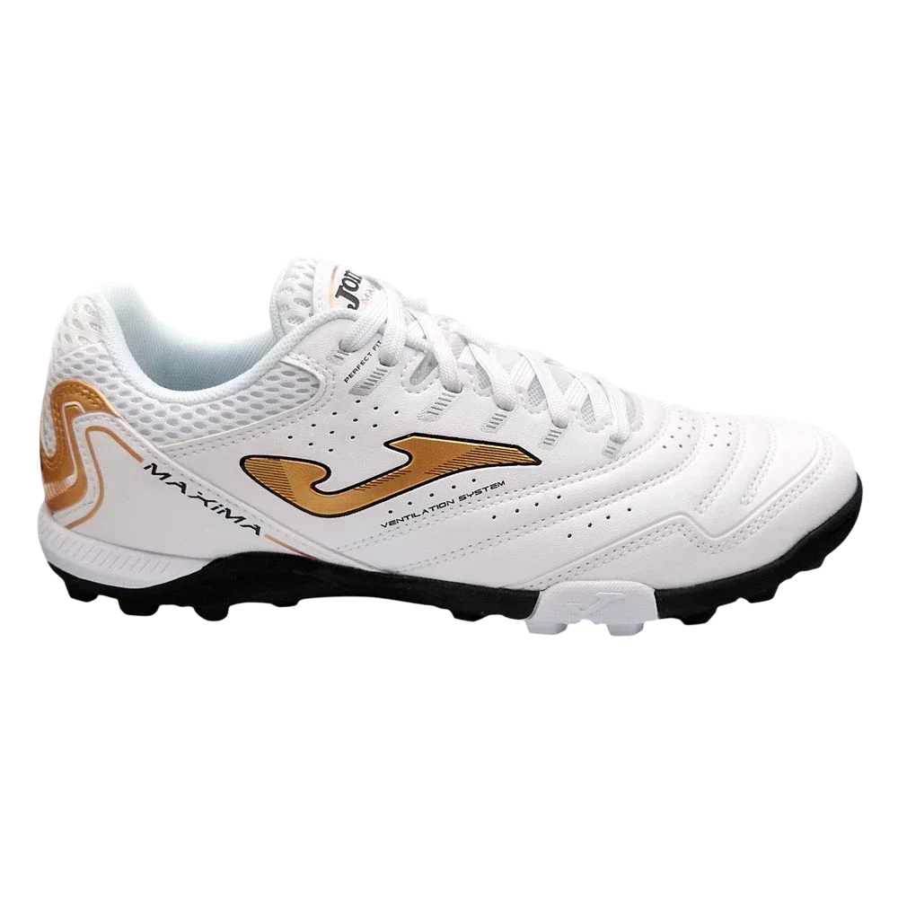 Joma Maxima turf soccer shoe in white synthetic material with gold accents, perforated panels and rubber turf studs