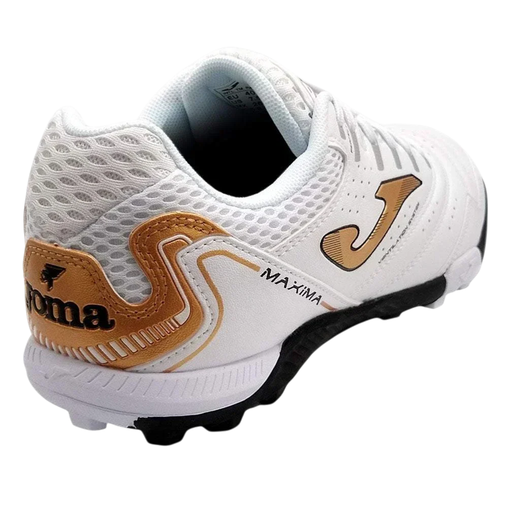 Joma Maxima turf soccer shoe in white synthetic material with mesh panels, tan accents, and a black rubber outsole