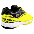 Joma Toledo indoor soccer shoe in neon yellow and black synthetic material, with striped panels and white sole