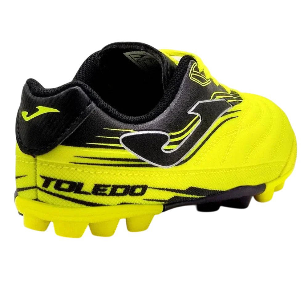 Joma Toledo junior molded soccer cleat in neon yellow and black with a synthetic upper and molded studs