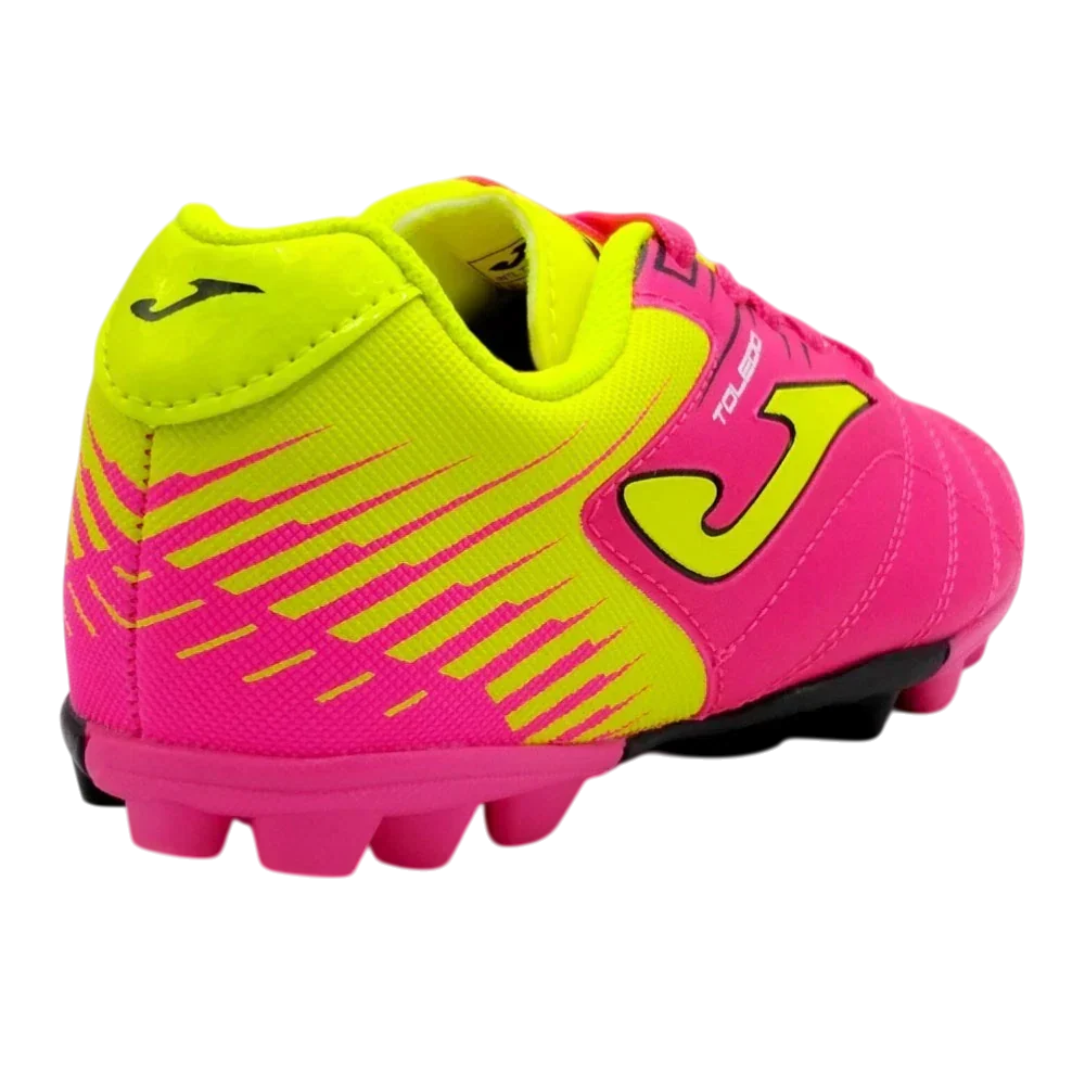 Joma Toledo soccer cleat in neon yellow and hot pink with a synthetic upper, striped graphics, Joma logo and molded studs