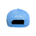 Manchester City Adjustable Cap in sky blue fabric, showing white MAN CITY embroidery and a blue snapback strap