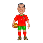Minix Cristiano Ronaldo figurine wearing a red Portugal shirt and green shorts, holding a gold football