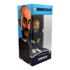 Minix Pep Guardiola Manchester City figurine in black outfit and white shoes, displayed in a blue branded window box